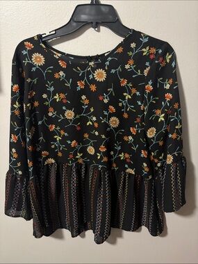 Black Floral Peplum Blouse with Ruffle Hem